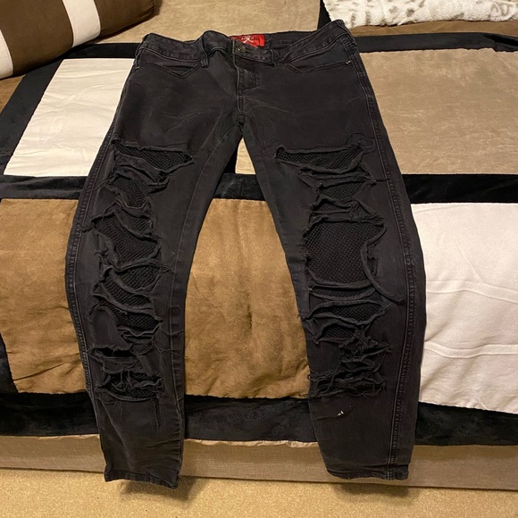 royal bones by tripp black strap skinny jeans